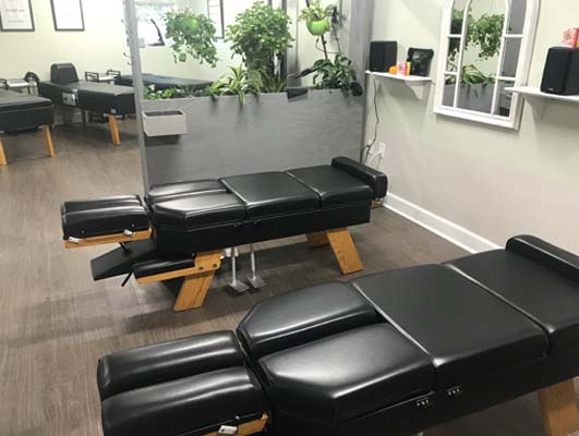 Chiropractic Greensboro NC Adjustment Tables